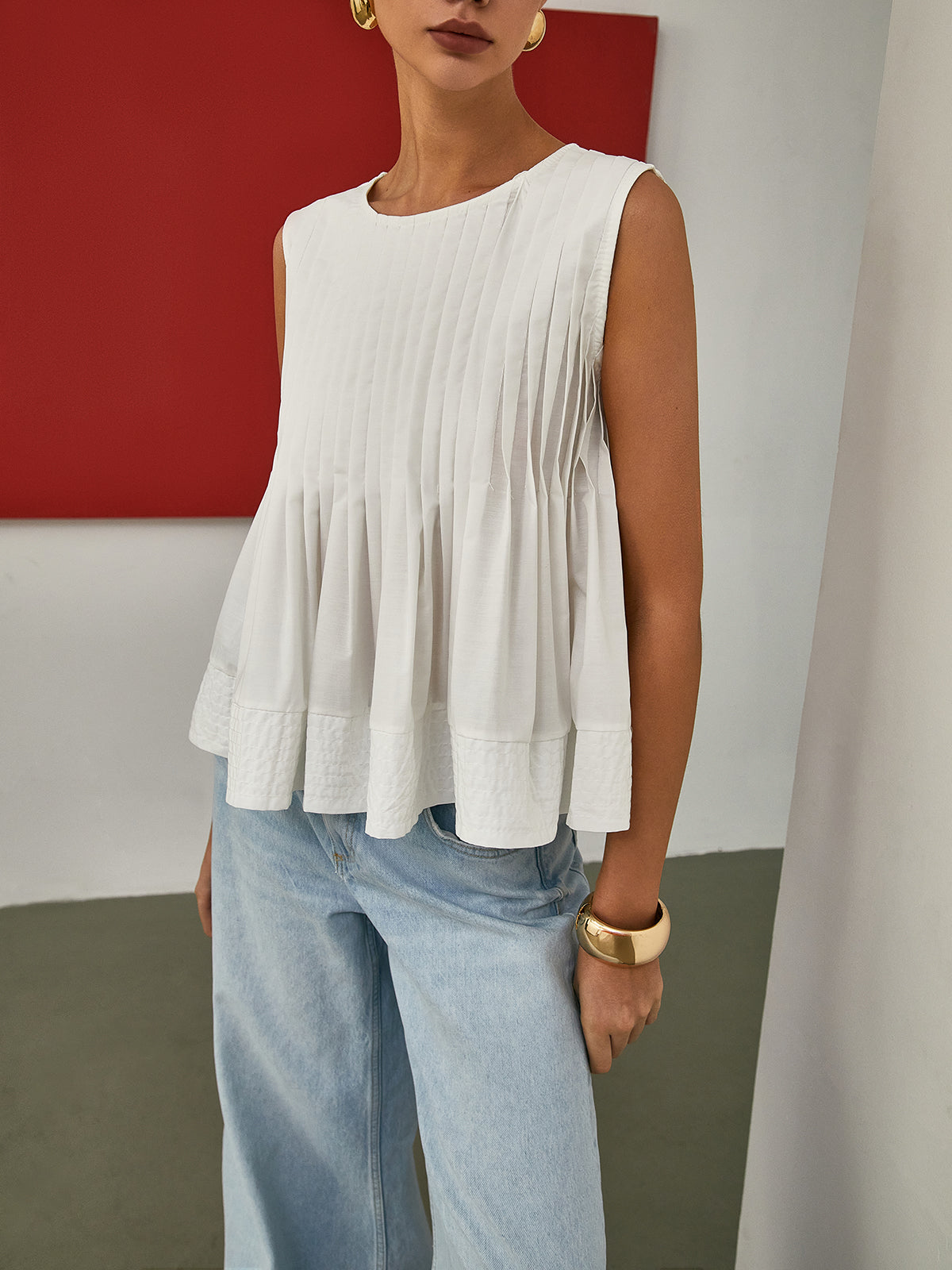 Pleated Peplum Sleeveless Blouse Pleated Peplum Sleeveless Blouse